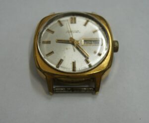 Raketa golden shockproof watch with calendar day+date