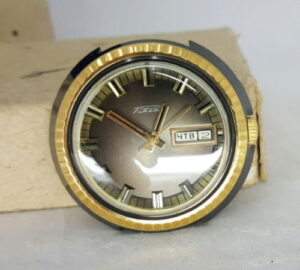 Raketa golden shockproof watch with calendar day+date